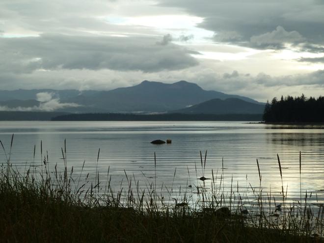 Sunset casts silvery light over Vancouver Island and Broughton Strait - British Columbia © Duart Snow